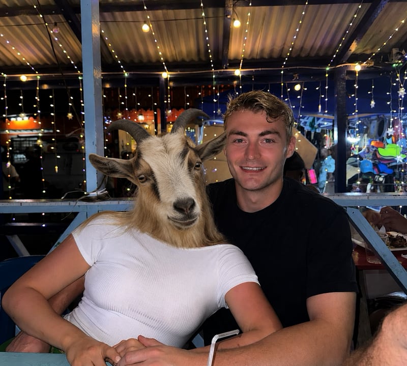 Elliot Stocks with a goat by his side