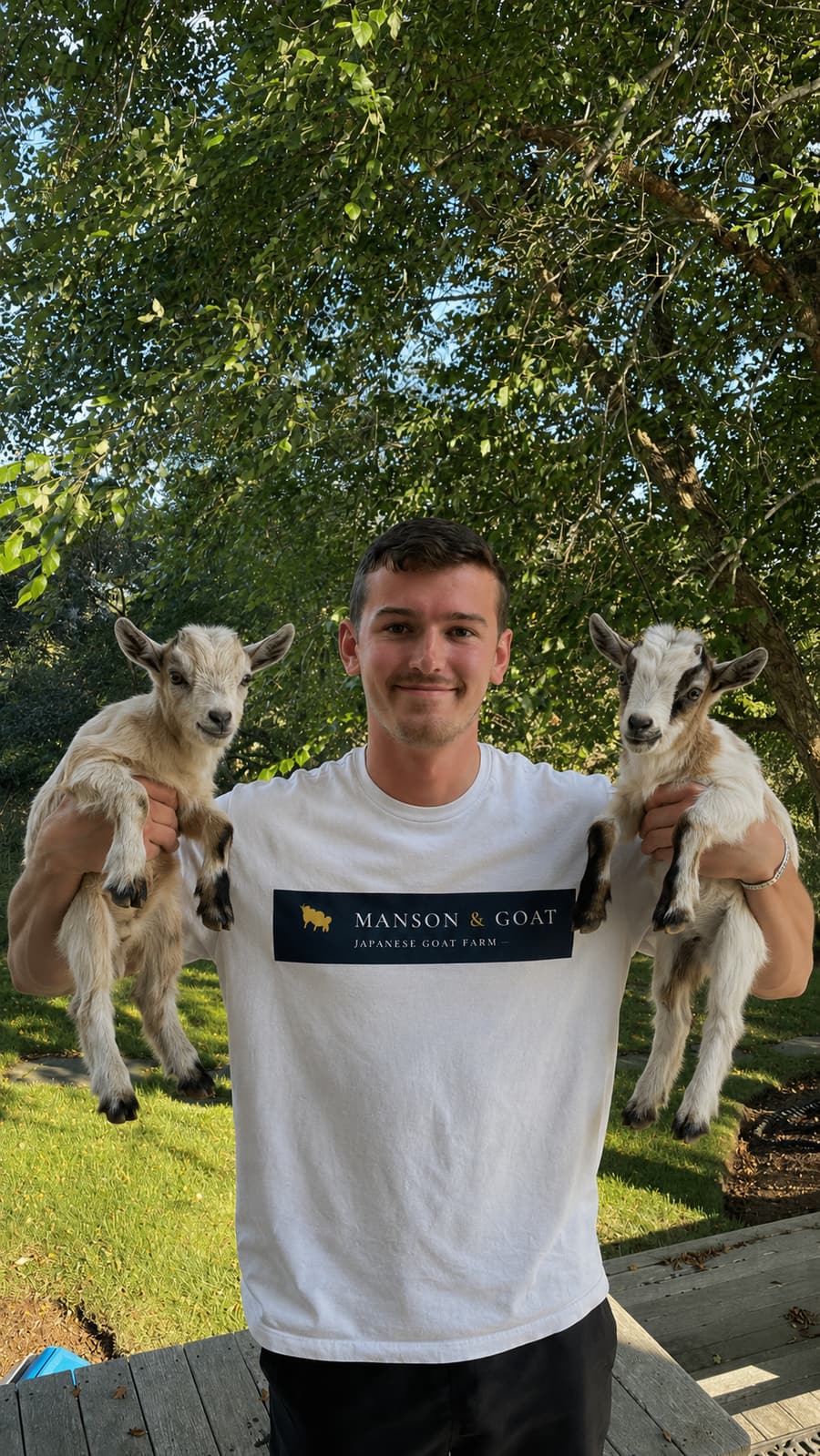 Moe Manson today in a Manson & Goat shirt, holding two goats